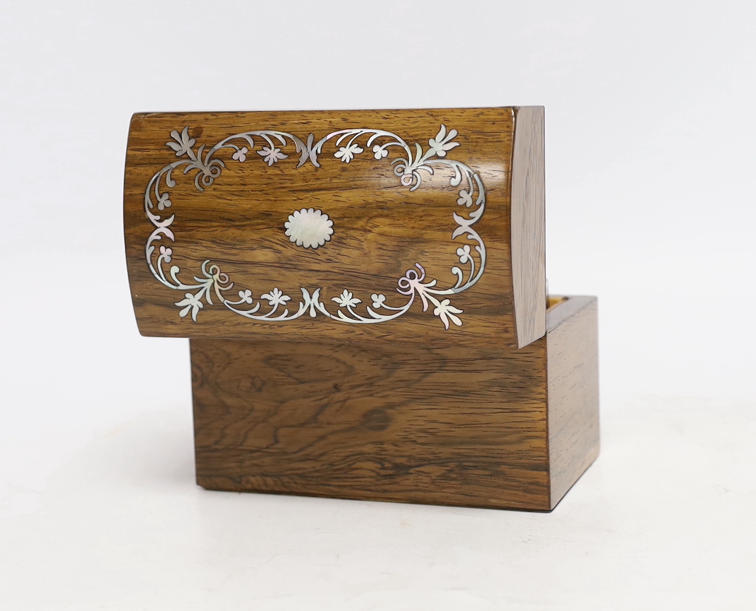 A 19th century mother-of-pearl inlaid rosewood travelling toilet box with two white metal mounted bottles, 14cm wide